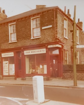Arthur Garnett outside the shop in 1972